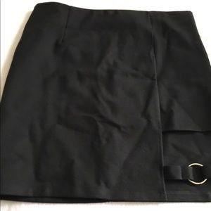 Black mini skirt with strap detail